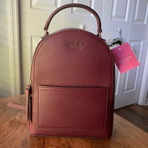Burgundy Kate Spade mini backpack